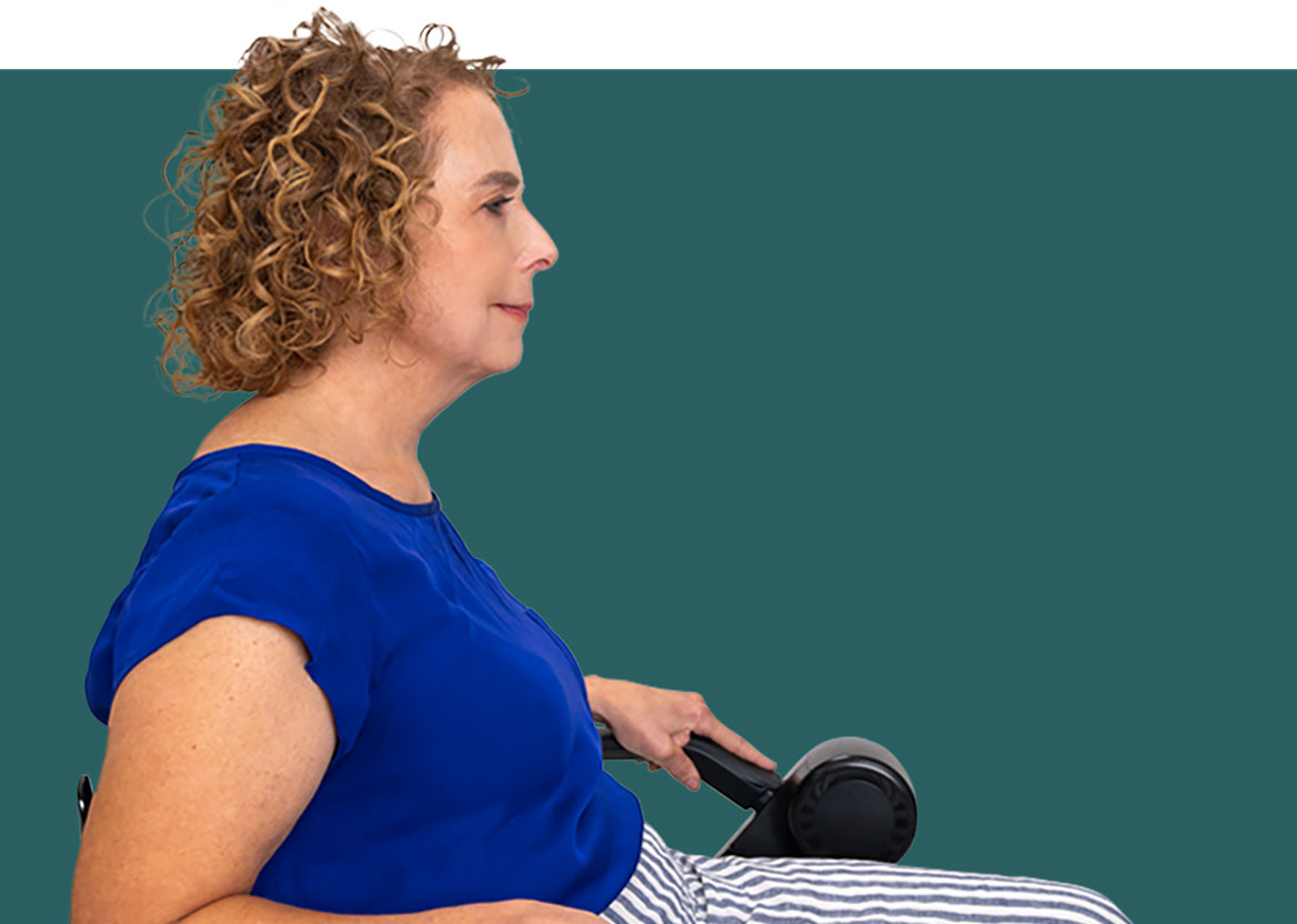 Profile of a woman with Friedreich ataxia sitting.